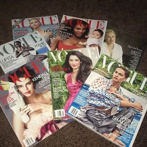 7 Vogue magazines